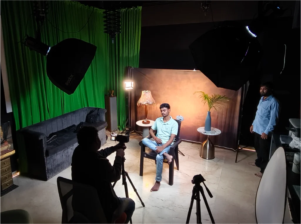 Behind the scenes podcast shoot with crew and cameras at Cinera Films Studio Pune