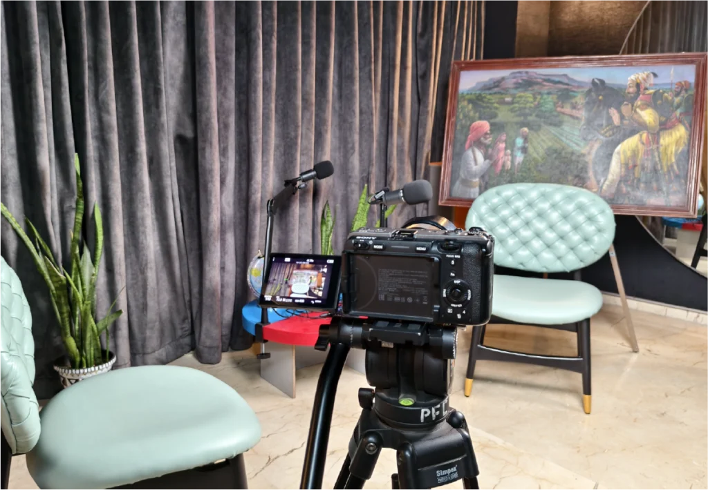 Podcast and interview shoot setup in Pune studio with professional lighting and cameras