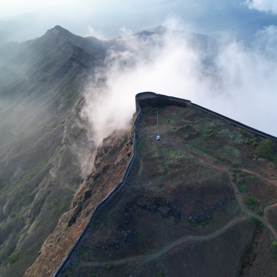 Aerial drone cinematography of Torna Gad fort in Maharashtra captured by Cinera Films Studio