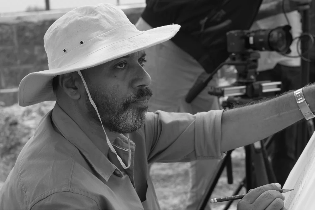 Cinematographer filming professional visual content at Cinera Films Studio Pune