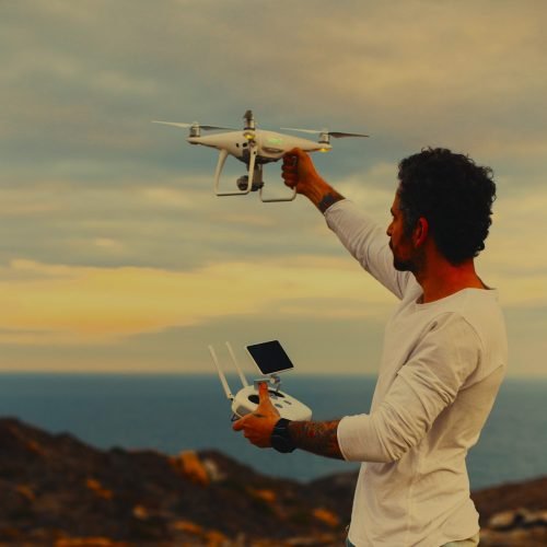 drone pilot photographer prepares launch flight